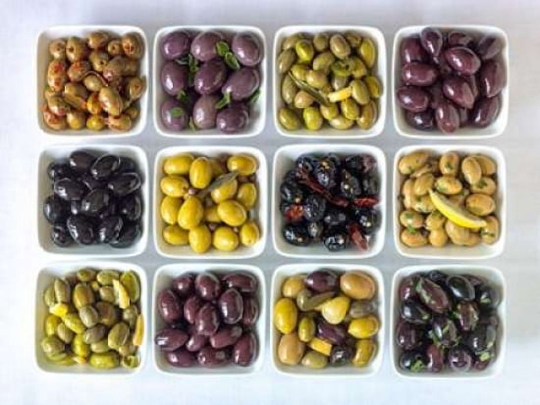 Varieties of Olives in bowls on white background Canvas Art - Assaf Frank (18 x 24)