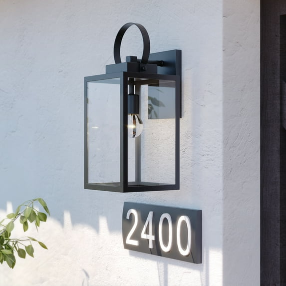 Vaxcel Medinah 7-in. W 1 Light Dusk to Dawn Black Outdoor Wall Lantern Clear Glass