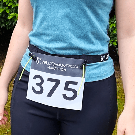 Velochampion Adjustable Elastic Running Number Waist Belt. Stretch Fit Black with Buckle Fastening