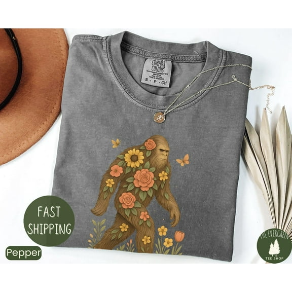 Velto Bigfoot Adventure T-shirt, Floral Sasquatch Graphic Apparel, Cute Outdoor Nature Lover Outfit, Aesthetic Gift Clothing for Women, Full Size S-5XL