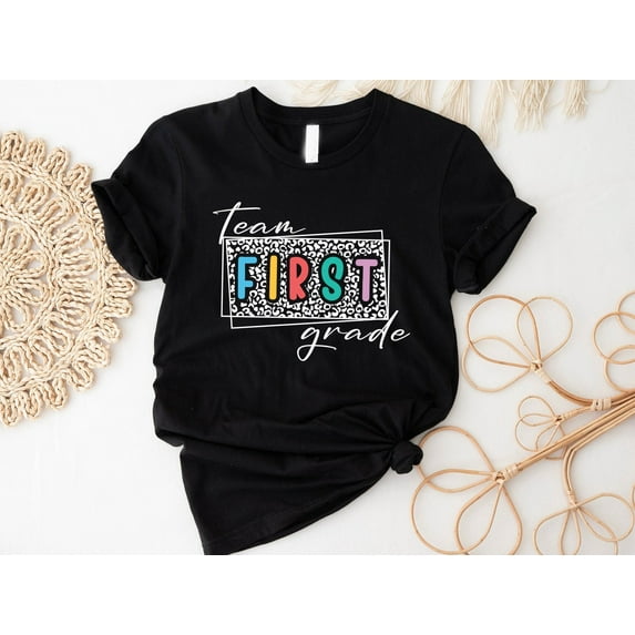 Velto First Grade Teacher Graphic Tshirt Elementary School Outfit Classroom Back To School Educator Gift Fullsize S-5XL Shirt