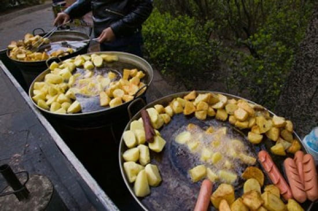 Vendor selling deep fried potatoes and sausages at a sidewalk food stall Old Town Dali Yunnan Province China Canvas Art - Panoramic Images (36 x 24)