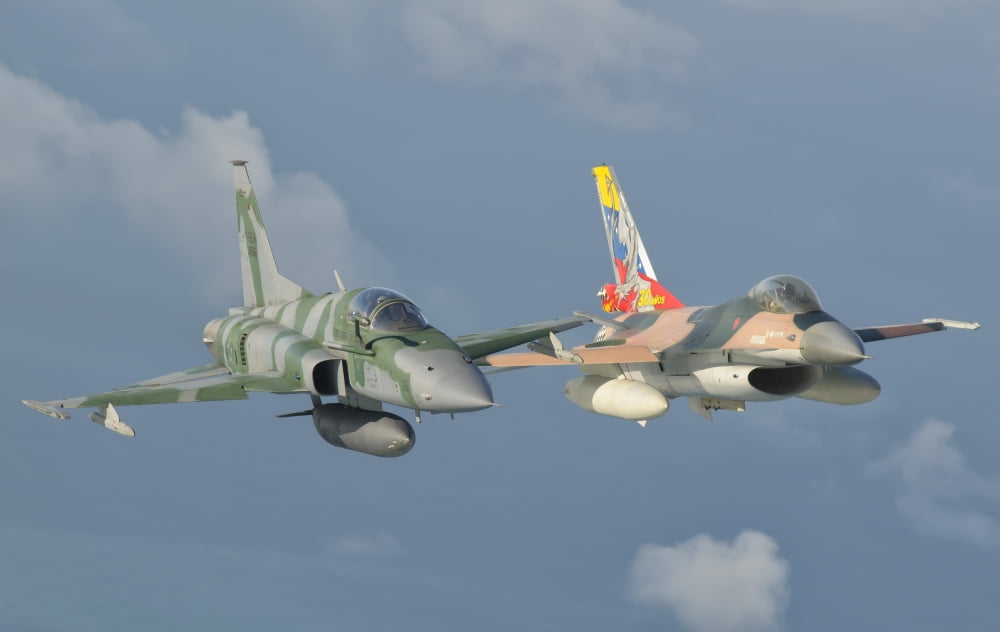 Venezuelan Air Force F-16 and Brazilian Air Force F-5 in flight over Brazil Canvas Art - Giovanni CollaStocktrek Images (18 x 11)