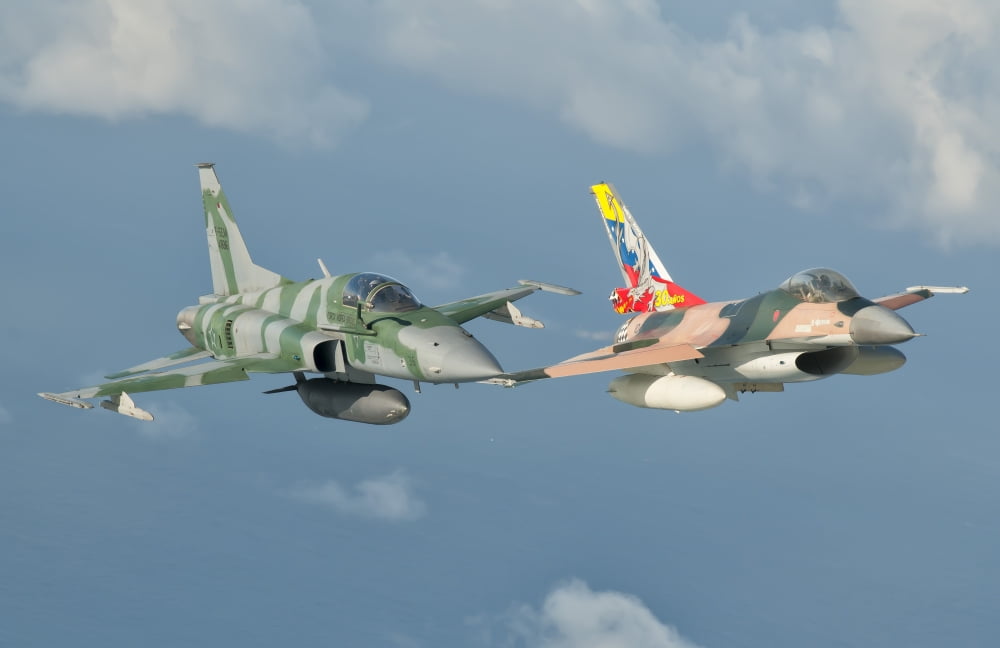 Venezuelan Air Force F-16 and Brazilian Air Force F-5 in flight over Brazil Canvas Art - Giovanni CollaStocktrek Images (35 x 23)