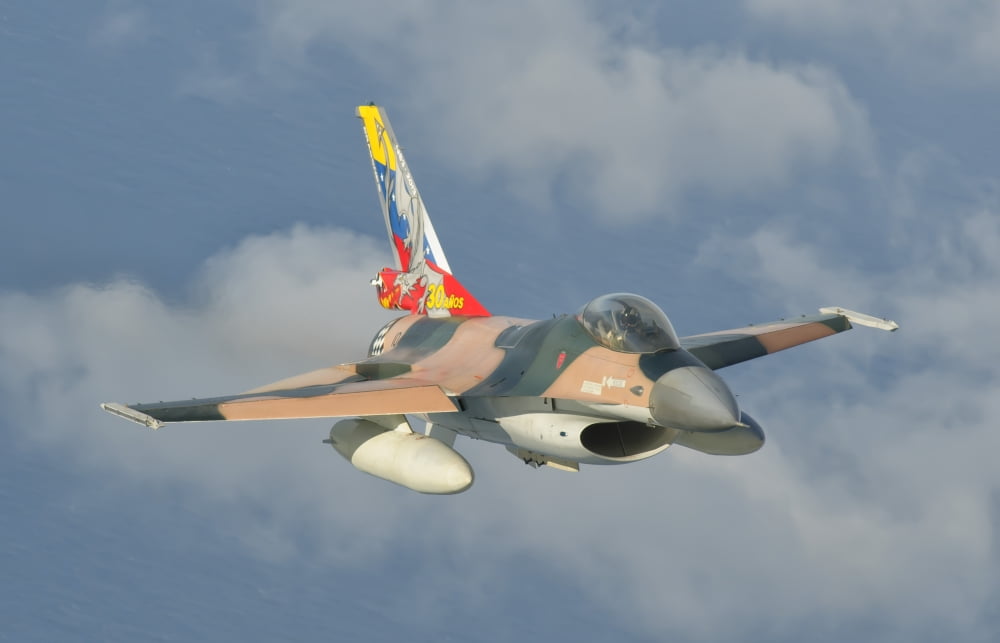 Venezuelan Air Force F-16 in flight over Brazil Canvas Art - Giovanni CollaStocktrek Images (35 x 23)