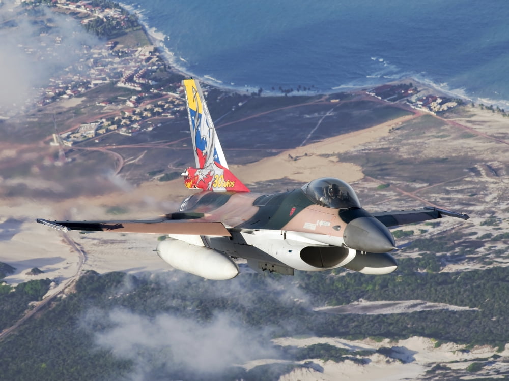 Venezuelan Air Force F-16A flying over Natal Brazil Canvas Art - Daniele FaccioliStocktrek Images (33 x 25)