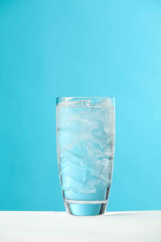 Very Full Glass Of Water With Ice Canvas Art - Greg Huszar Photography  Design Pics (22 x 34)