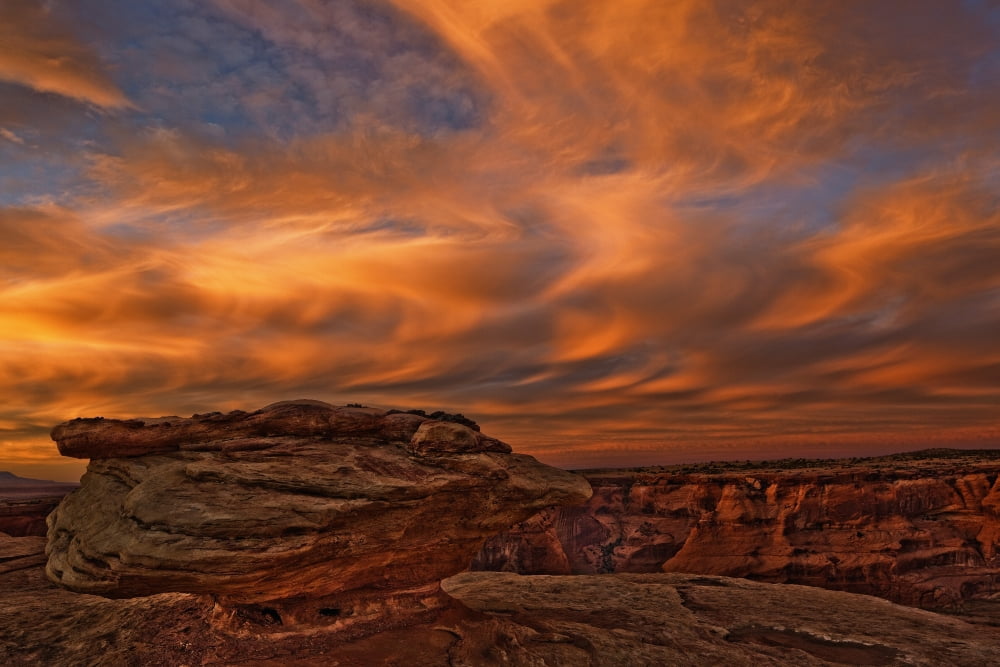 Vibrant Sunset Over The Rim Of Canyon De Chelley And Natural Rock Formation Arizona Canvas Art - Robert Postma Design Pics (17 x 11)