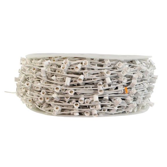 Vickerman 1000' C7 Socket Wire with 2000 C7 Sockets on SPT-2, 18 Wire Gauge, White. 1000' Length strand. 6" Socket spacing. 12" Male lead, 6" crimped end. Ability to replace the fuses in sockets.