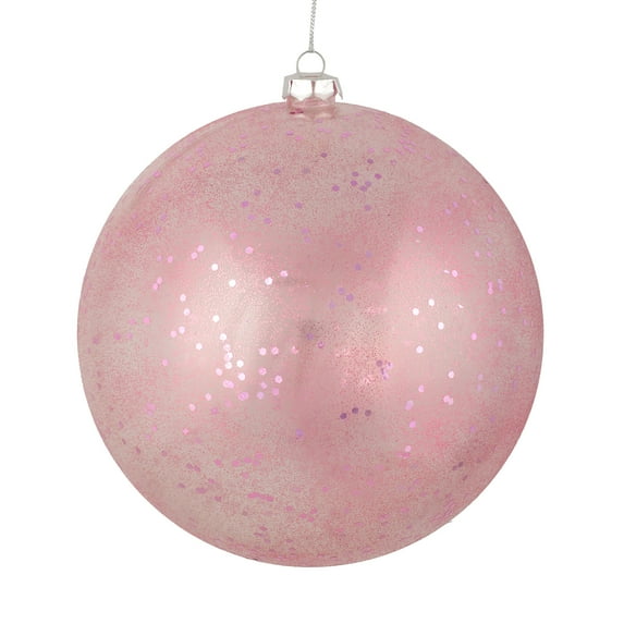 Vickerman 4" Mauve Glitter Clear Ball. This ornament features a clear complexion with a dusting of mauve glitter inside. Add a touch of glam to any holiday arrangement with this delicate looking ornam