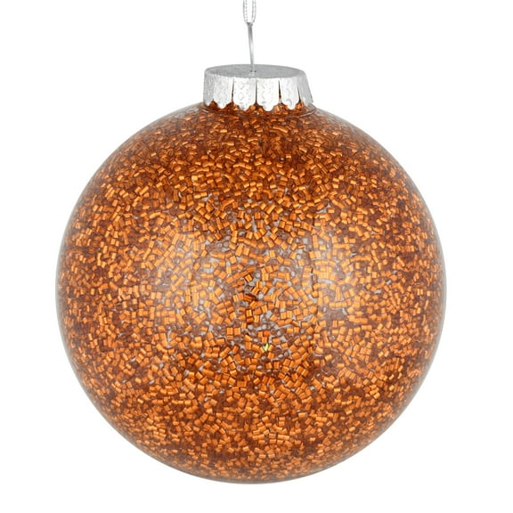 Vickerman 6" Copper Tinsel Clear Ball Orn 4/Bag. This clear ball features colored glitter and tinsel on the inside. Add some sparkle to your holiday decorating projects with this tinsel ornament. Made