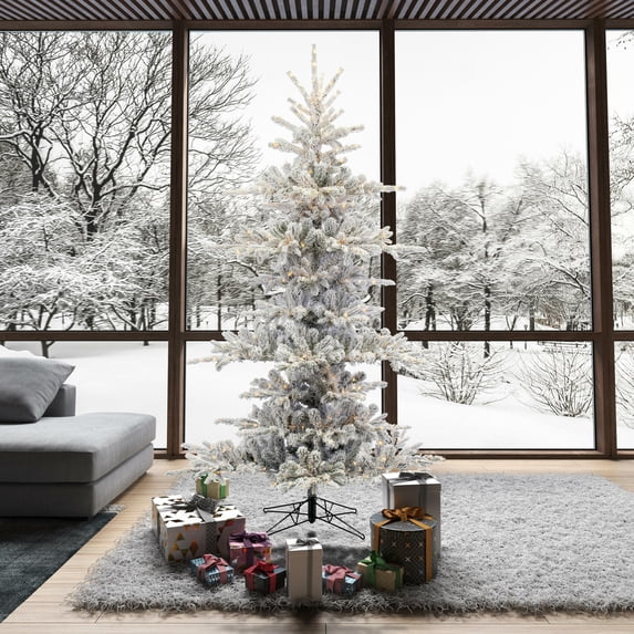 Vickerman 7.5' x 57" Flocked Yukon Display Artificial Christmas Tree with Warm White LED Lights.