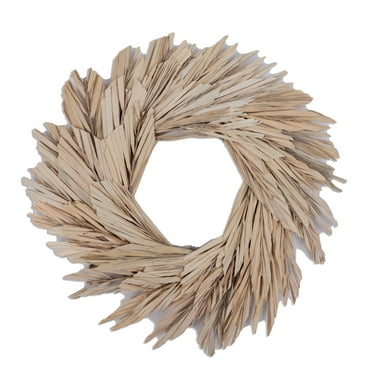 Vickerman Natural Botanicals 17" Bleached Canna Leaf Wreath. This wreath measures 17 inches in diameter. It features bleached canna leaves on a coco fiber base. This is a dried and preserved natural p