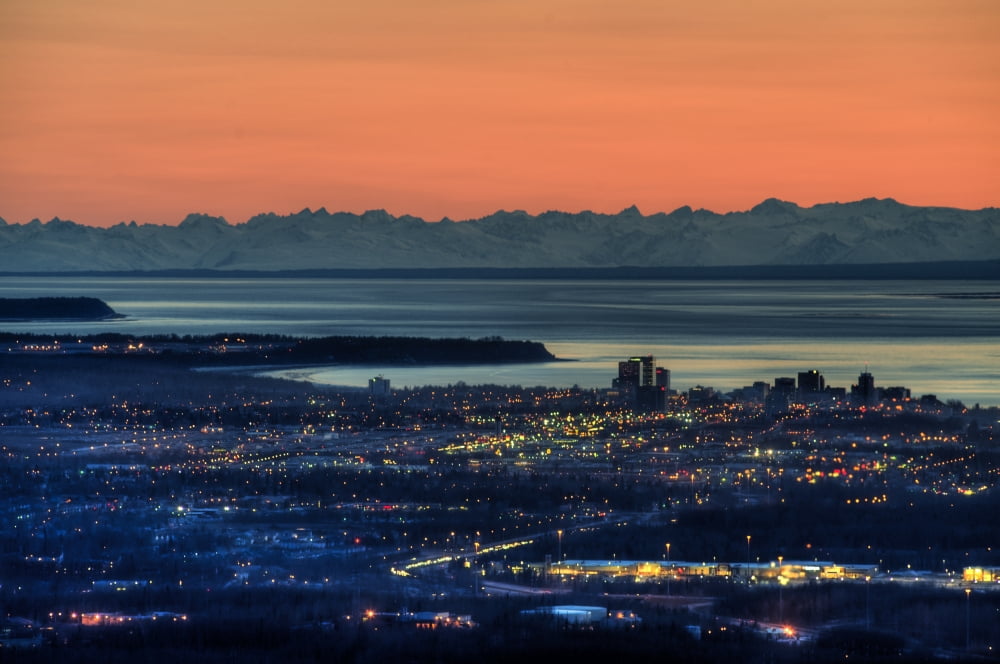 View Of The Anchorage Skyline At Sunset With The Cook Inlet In The Background Southcentral Alaska Spring Canvas Art - Michael Jones Design Pics (17 x 11)