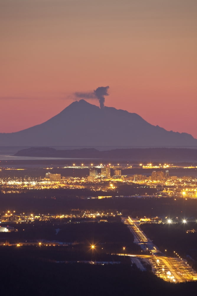 View Of Minor Eruption Of Ash And Steam From Mt Redoubt With Anchorage Alaska In The Foreground During Winter Canvas Art - Calvin Hall Design Pics (11 x 17)