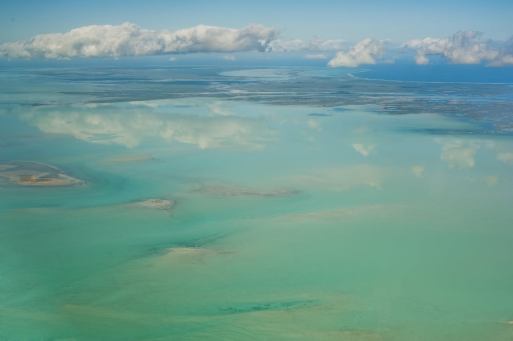 View Of The Ocean And Clouds In The Sky South Caicos Turks And Caicos Islands Canvas Art - Helene Cyr  Design Pics (38 x 24)