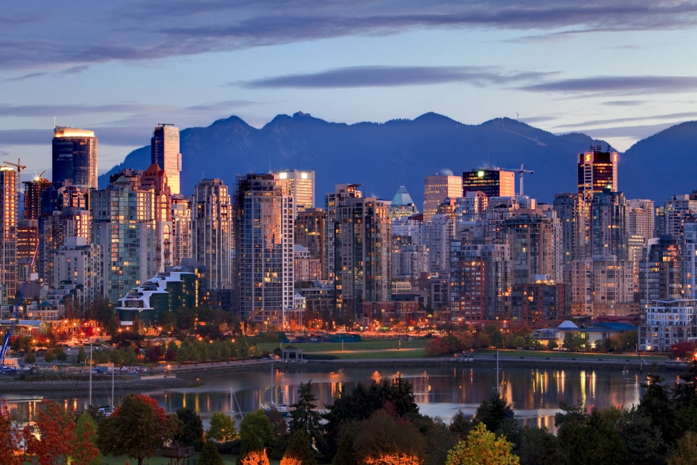 View Of Skyline With Yaletown False Creek And North Shore Mountains Site Of 2010 Winter Olympics Vancouver British Columbia Canvas Art - Ron Watts Design Pics (34 x 22)