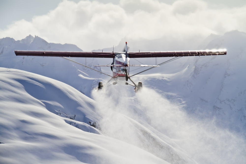 View of a Super Cub air taxi at Tanaina Glacier in the Neacola Mountains Aleutian Range Southcentral Alaska Winter Canvas Art - Joe Stock Design Pics (19 x 12)