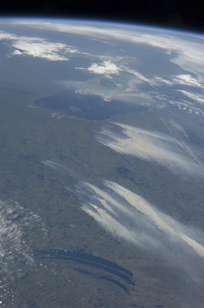 View from space of the wildfires southeast of James Bay in Quebec Canada Canvas Art - Stocktrek Images (23 x 34)