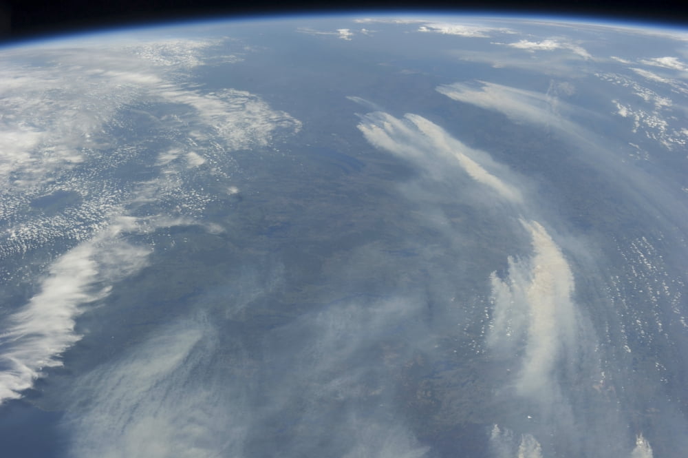 View from space of the wildfires southeast of James Bay in Quebec Canada Canvas Art - Stocktrek Images (34 x 23)