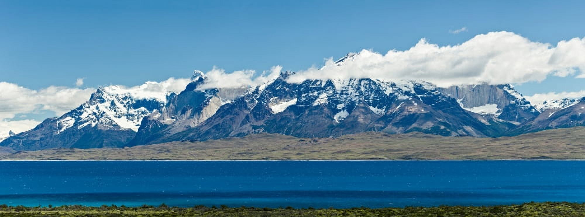 View of lake with snowcapped mountains Cordillera del Paine Sarmiento Lake Torres del Paine National Park Patagonia Chile Canvas Art - Panoramic Images (12 x 30)
