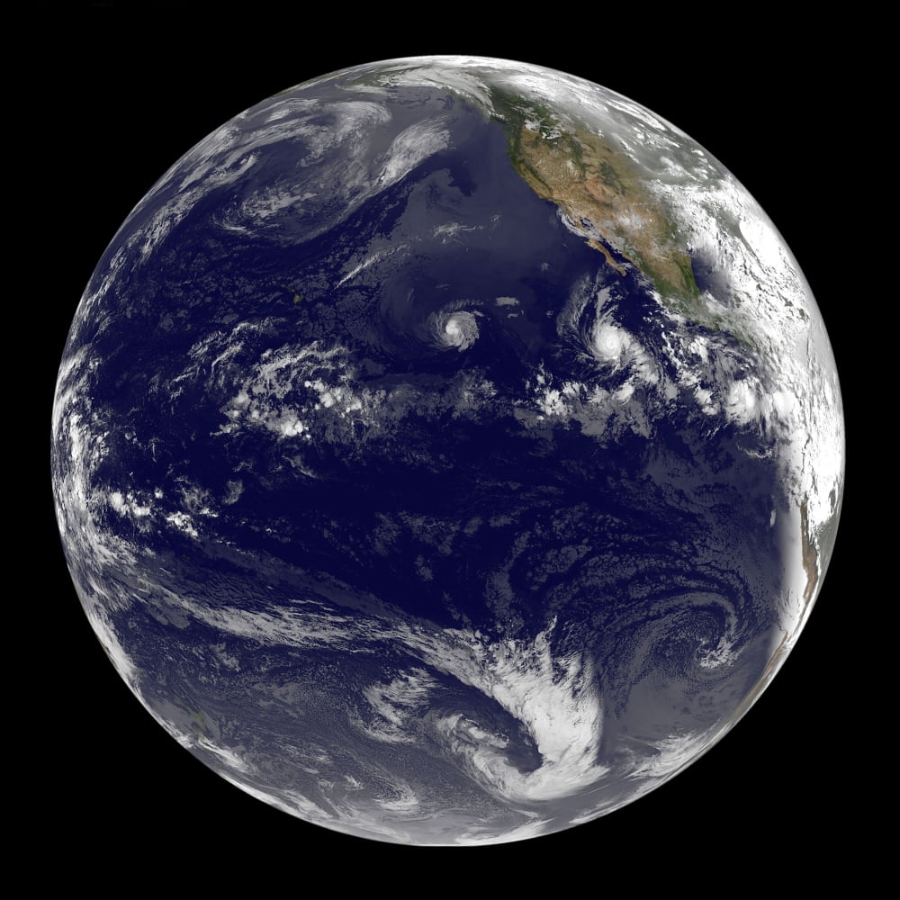 View of Earth showing three tropical cyclones in the Pacific Ocean Canvas Art - Stocktrek Images (28 x 28)