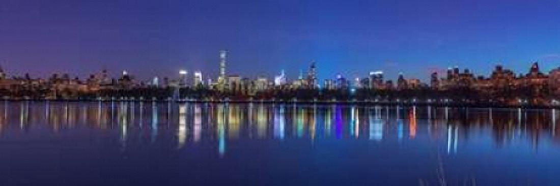 View of New York city skyline from Central park in evening Canvas Art - Assaf Frank (8 x 24)