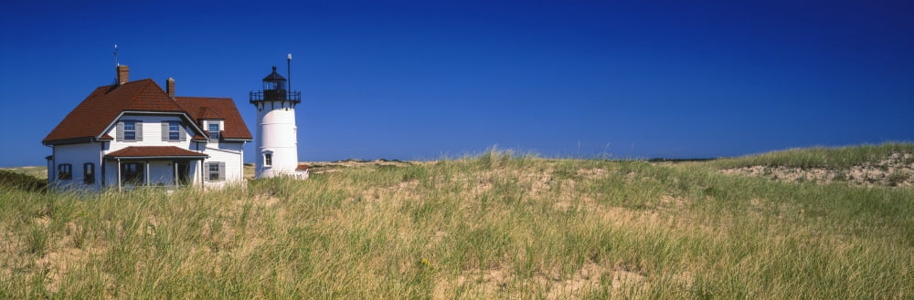 View of a lighthouse Race Point Light Provincetown Cape Cod Barnstable County Massachusetts USA Canvas Art - Panoramic Images (6 x 18)