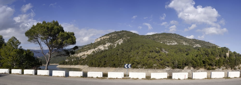 View of a road with mountain in background Valencian Community Province of Castellon Spain Canvas Art - Panoramic Images (27 x 9)