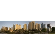 View of apartments and office buildings along, D 94 Roadway, The Ritz-Carlton, Dubai, United Arab Emirates Poster Print 27 x 9