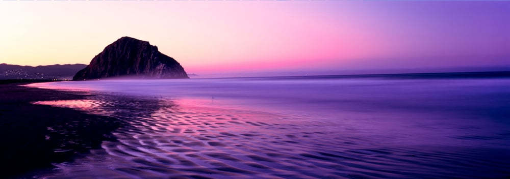 View of beach at sunrise Morro Rock Morro Bay San Luis Obispo County California USA Canvas Art - Panoramic Images (13 x 36)