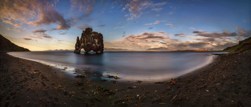 View of black sand beach at sunset Hvitserkur Iceland Canvas Art - Panoramic Images (13 x 30)