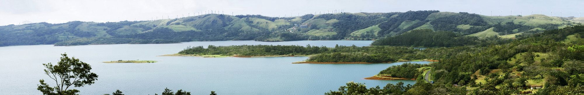 View of lake in Arenal Volcano National Park Costa Rica Canvas Art - Panoramic Images (55 x 9)