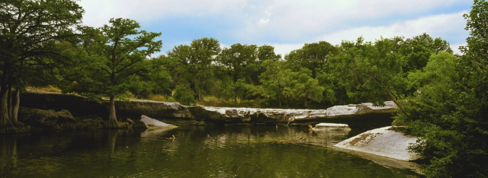 View of lake with trees at McKinney Falls State Park Austin Texas USA Canvas Art - Panoramic Images (27 x 9)