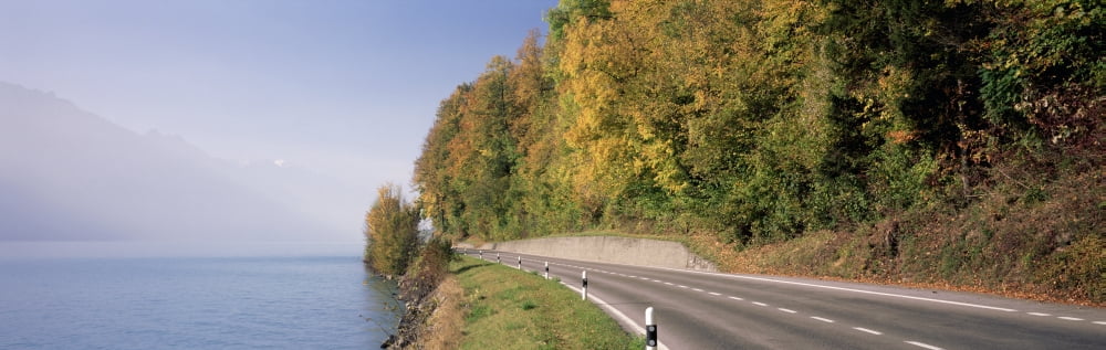 View of road by Lake Brienz Berne Canton Switzerland Canvas Art - Panoramic Images (6 x 18)
