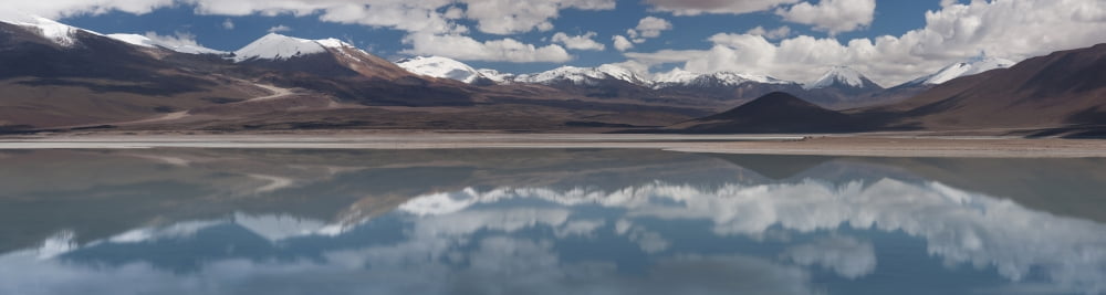 View of salt lake with mountain range in the background Laguna Blanca Potosi Department Bolivia Canvas Art - Panoramic Images (27 x 9)