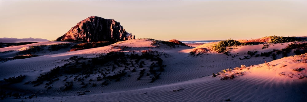 View of sand dunes and the Morro Rock Morro Bay San Luis Obispo County California USA Canvas Art - Panoramic Images (12 x 36)