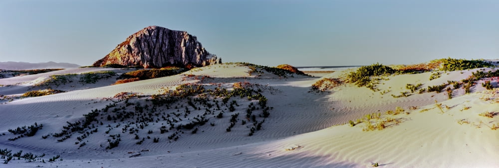 View of sand dunes and the Morro Rock Morro Bay San Luis Obispo County California USA Canvas Art - Panoramic Images (6 x 18)