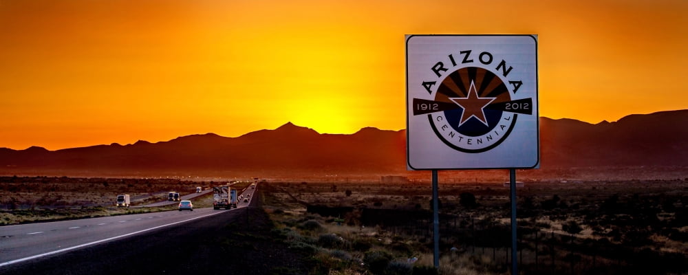 View of signboard at roadside on border at sunset Arizona USA Canvas Art - Panoramic Images (12 x 30)