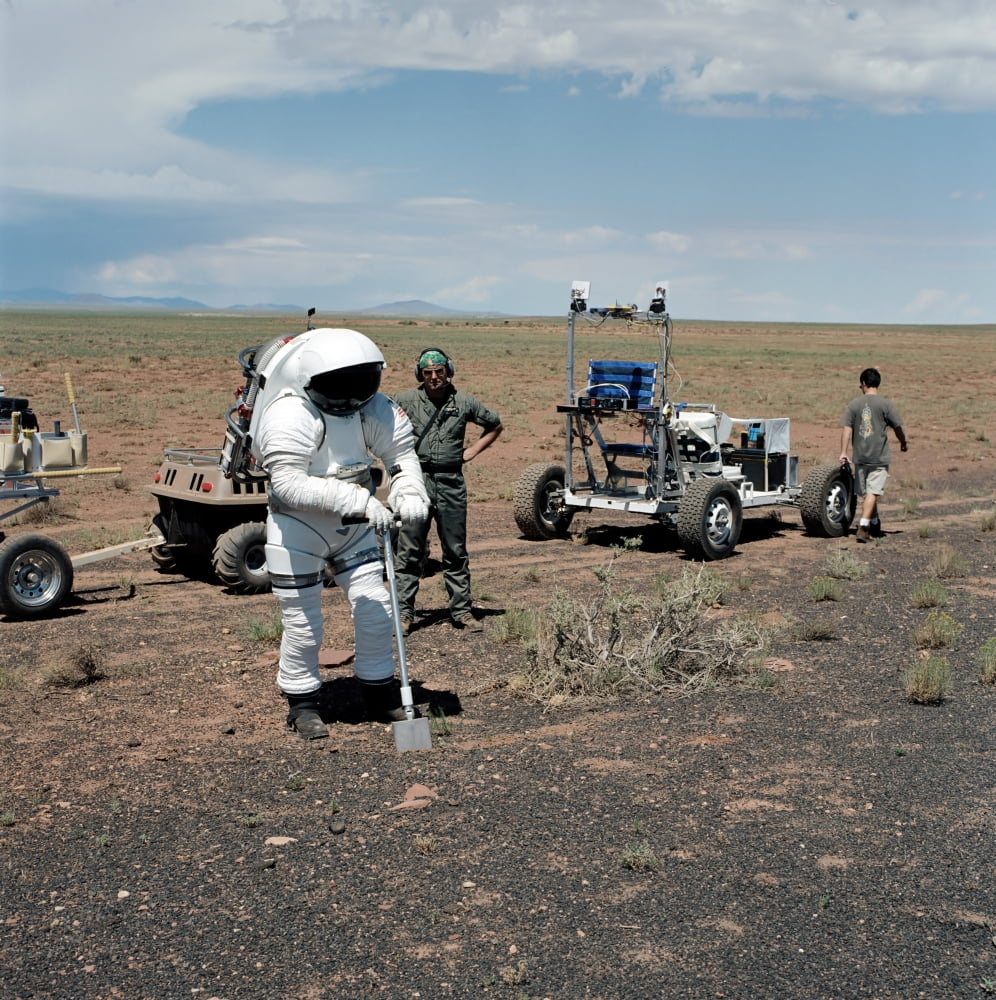 View of suited test subject and 1-G Lunar Rover Vehicle Canvas Art - Stocktrek Images (28 x 29)
