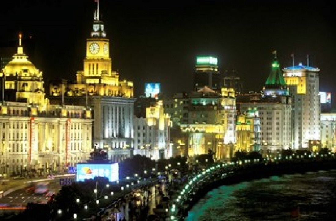 View of the Bund Area Illuminated at Night Shanghai China Canvas Art - Walter Bibikow DanitaDelimont (36 x 24)
