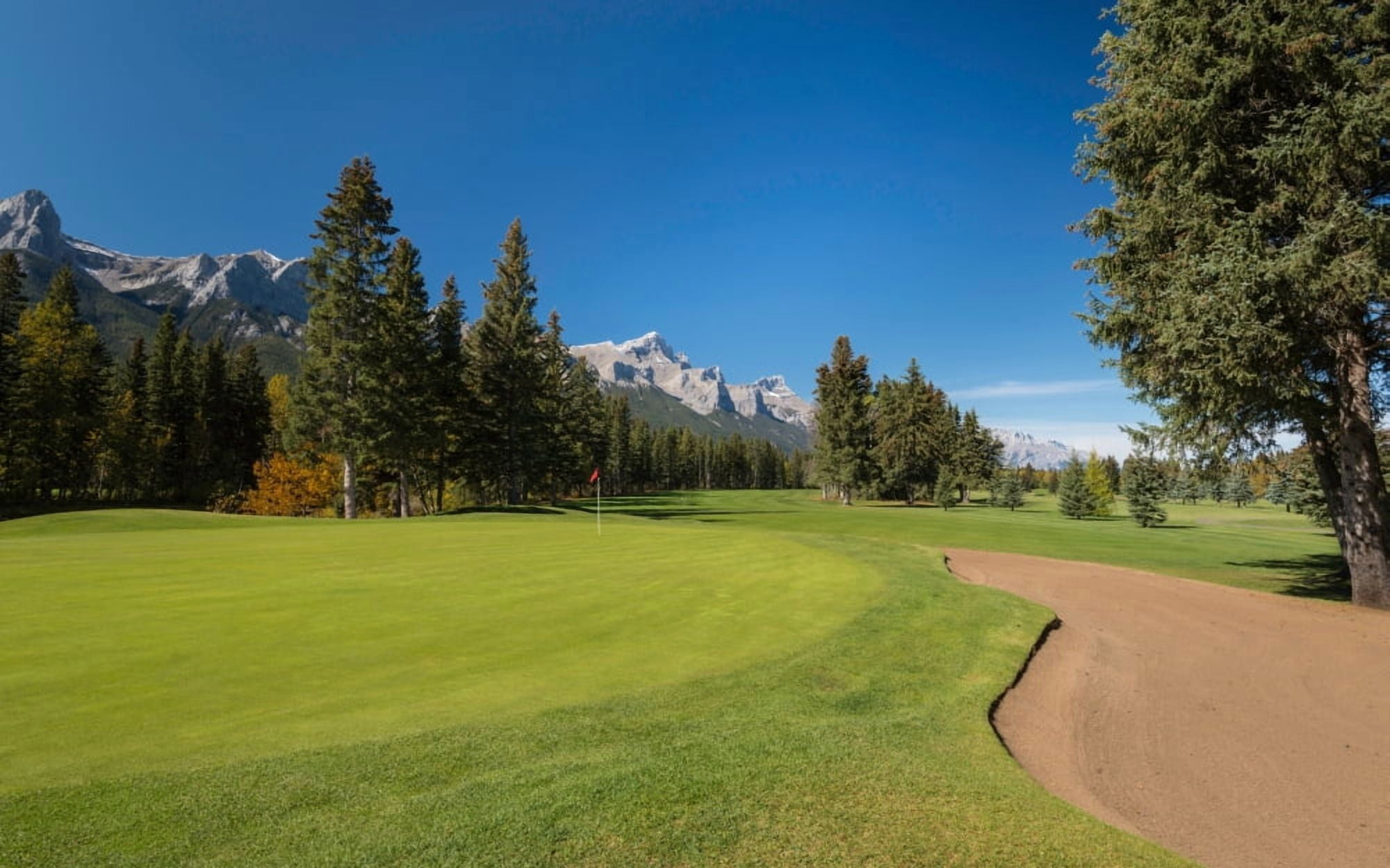 View of the Canmore Golf Course Mount Rundle Cascade Mountain Canmore Alberta Canada Canvas Art - Panoramic Images (12 x 20)