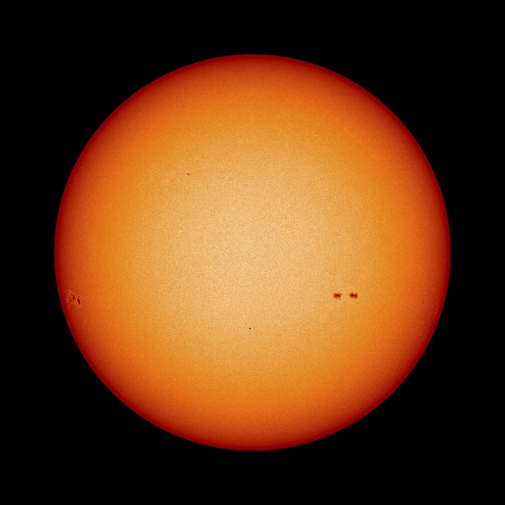 View of the Earth-facing surface of the Sun showing a few small sunspots Canvas Art - Stocktrek Images (28 x 28)