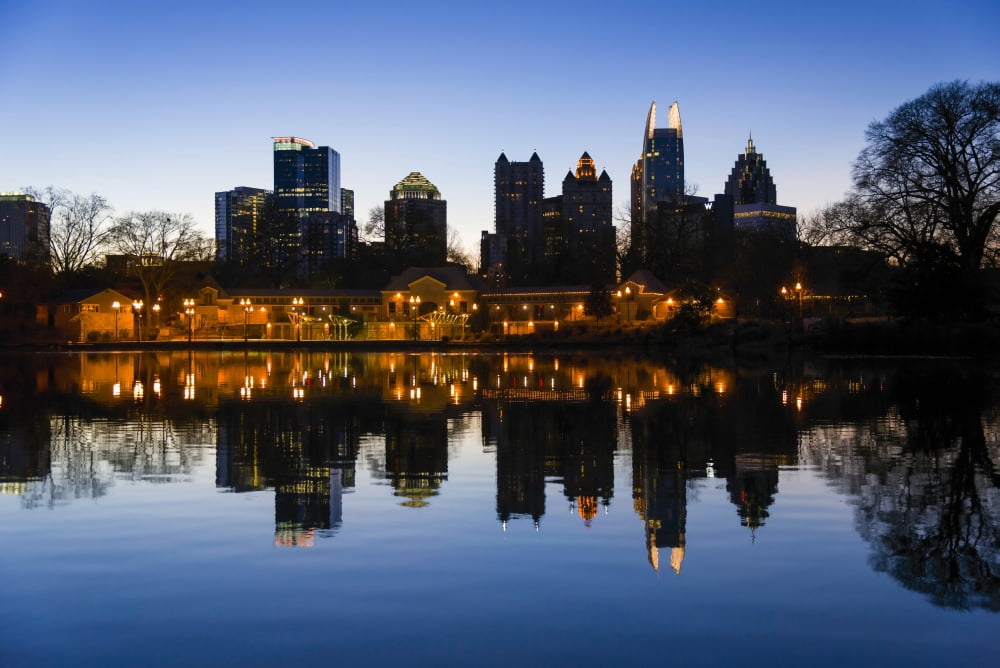 View of the Midtown skylines and lake at dusk Piedmont Park Atlanta Fulton County Georgia USA Canvas Art - Panoramic Images (36 x 12)
