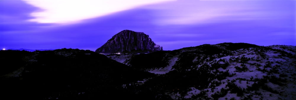 View of the Morro Rock at dusk Morro Bay San Luis Obispo County California USA Canvas Art - Panoramic Images (6 x 18)