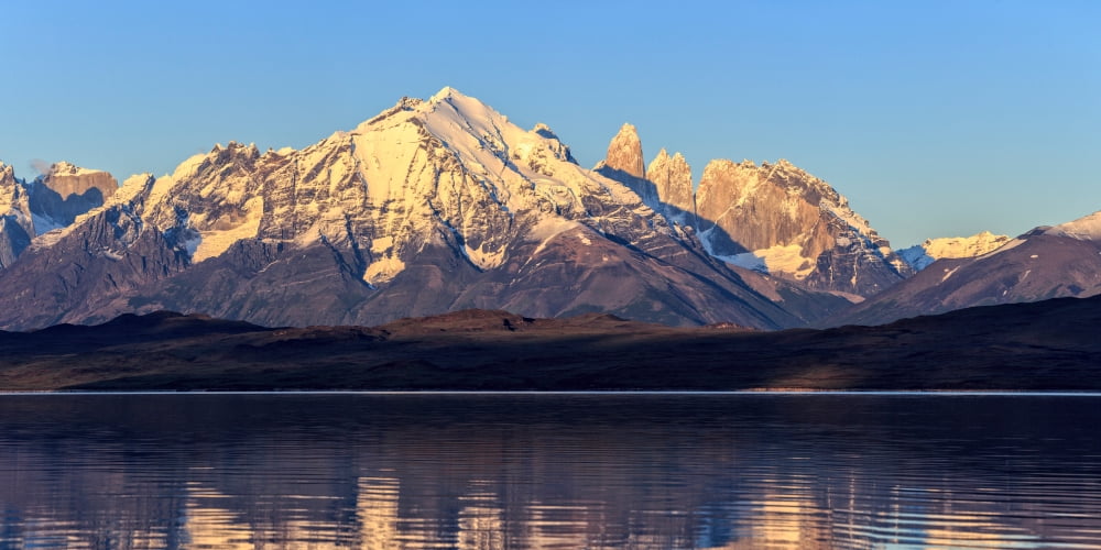 View of the Sarmiento Lake and Cordillera Paine at sunrise Torres del Paine National Park Patagonia Chile Canvas Art - Panoramic Images (12 x 24)