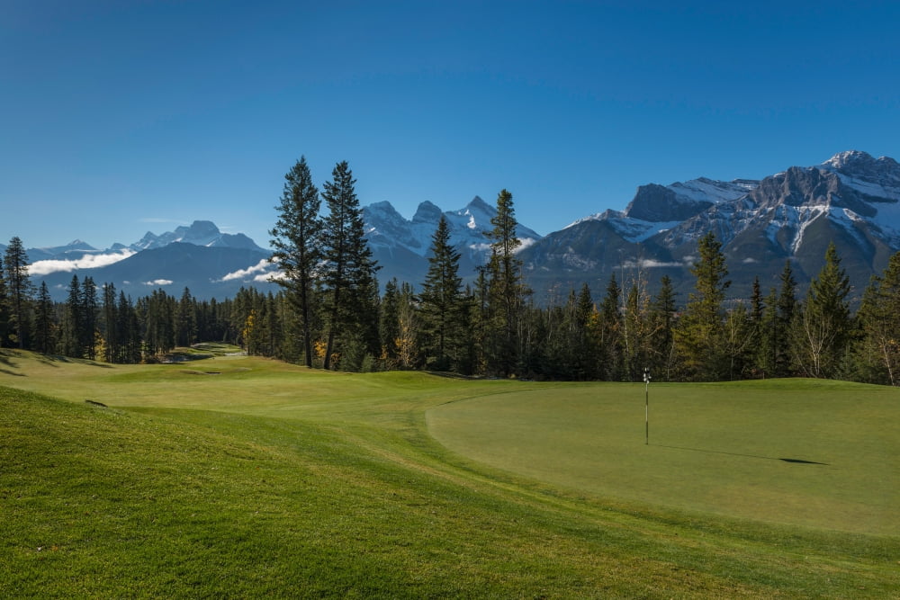 View of the Silvertip Golf Course Mount Lougheed Three Sisters Canmore Alberta Canada Canvas Art - Panoramic Images (18 x 24)