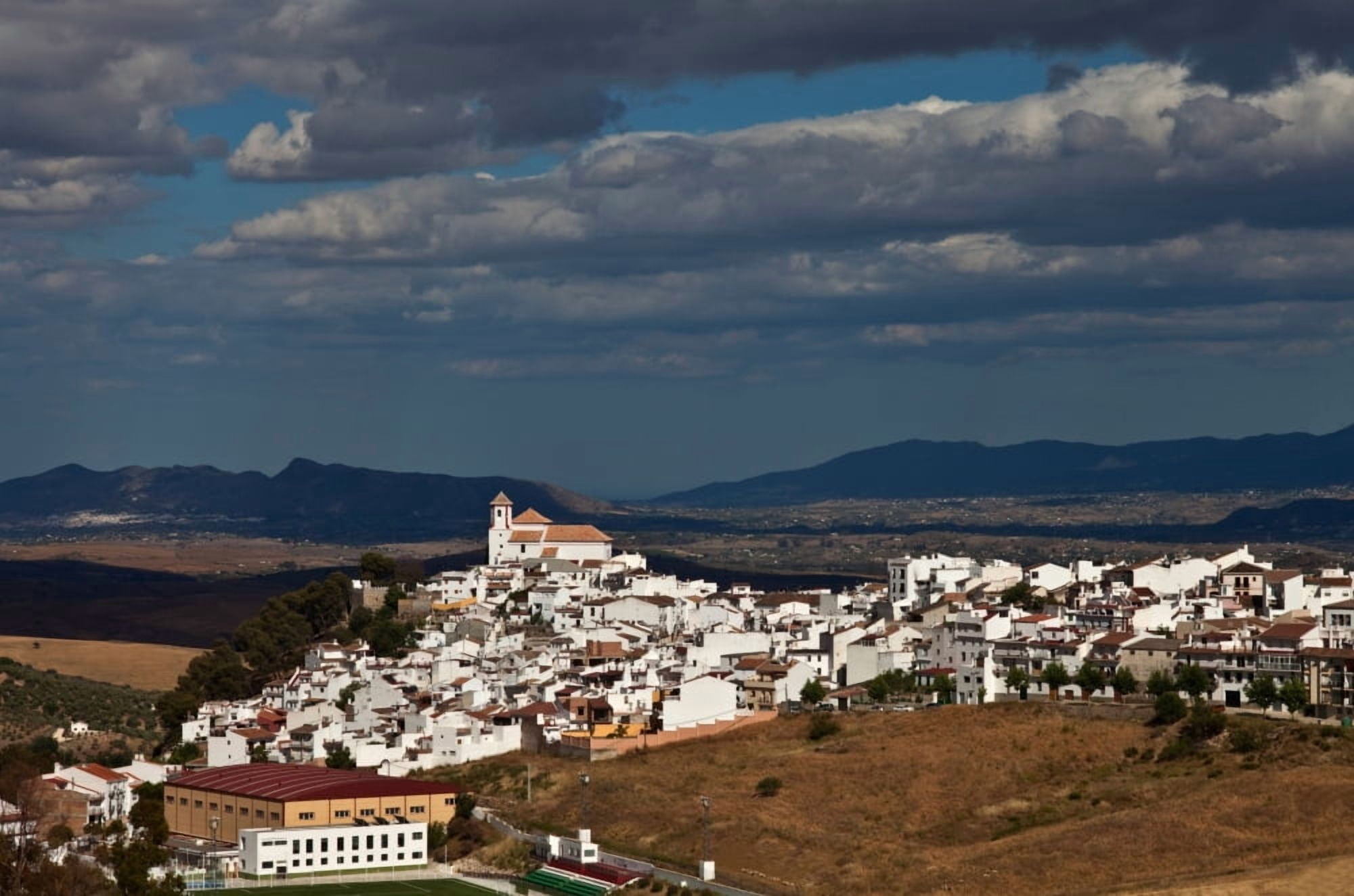 View of the hill top village of Alozaina from the north Malaga province Spain Canvas Art - Panoramic Images (12 x 36)
