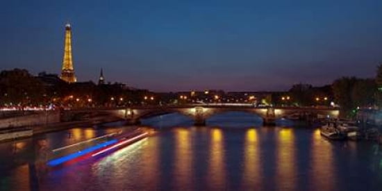 View of the river Seine the Eiffel Tower in the background during evenig Paris France Canvas Art - Assaf Frank (10 x 20)