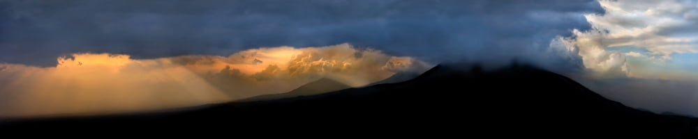 View of volcanoes at sunset Volcanoes National Park Rwanda Canvas Art - Panoramic Images (27 x 9)